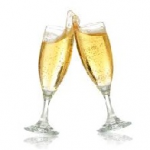 two champagne glasses, clinked together